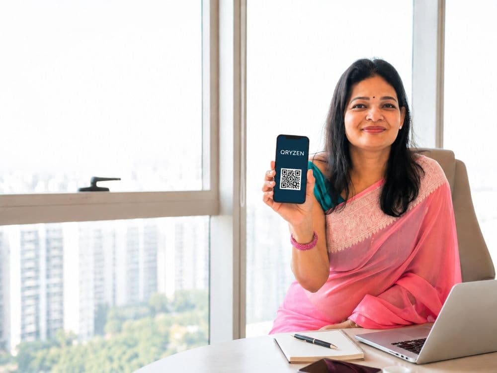 Anu Taksali, founder of QRYZEN, sharing her details with a QR code